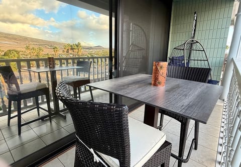 Polarized floor to ceiling views with high quality blackout shade for rest.  Hanging nest chair, seating for two on the balcony.