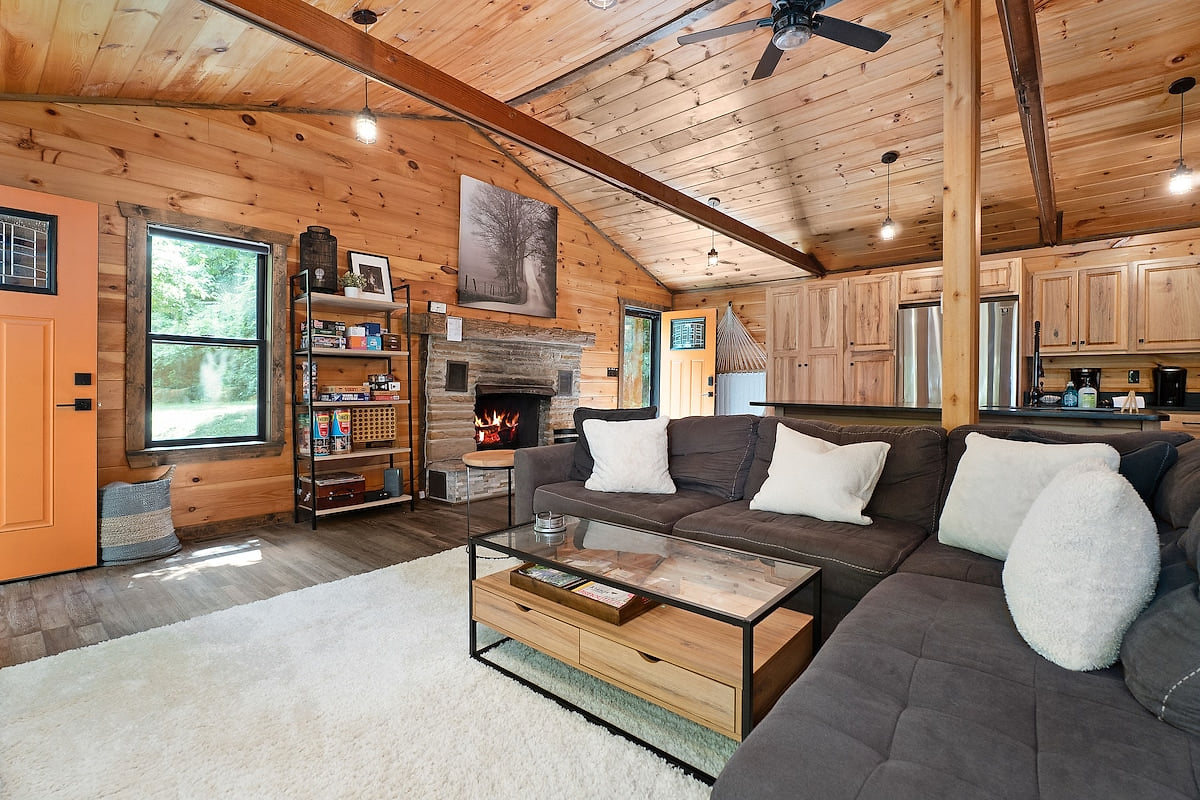 Comfortable living area blending modern style with rustic warmth—great for lounging or family time.