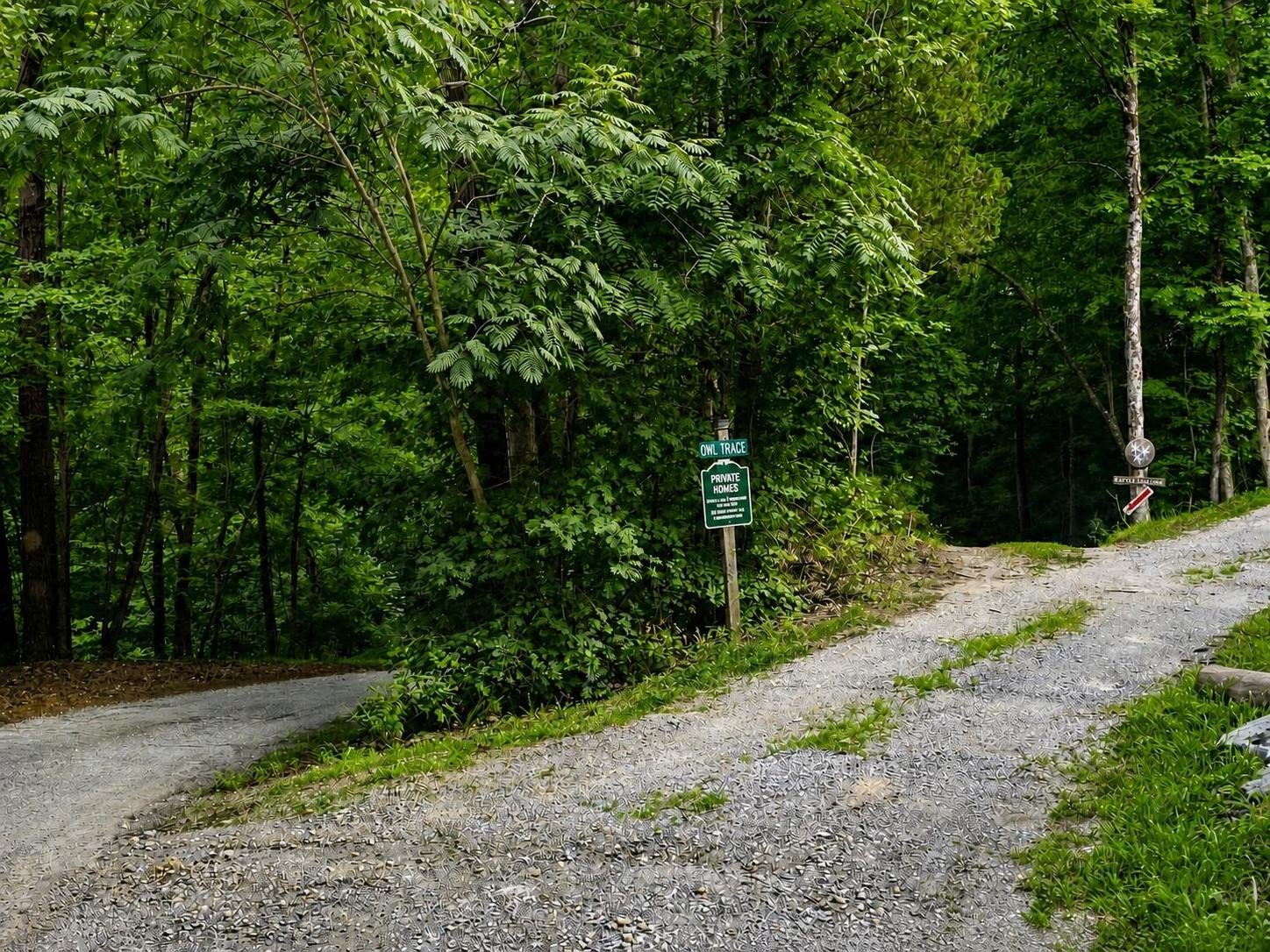 There are two entrances to eth property. for this entrance Puckett Road is to the left and a quick turnoff and following the red arrow and sign to "The Little Lake House" takes you home. The other entrance is further down Puckett Road.