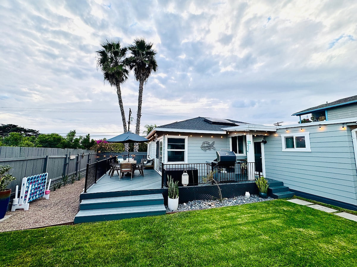 Enjoy a private, fenced back yard with outdoor table perfect for dining al fresco. 