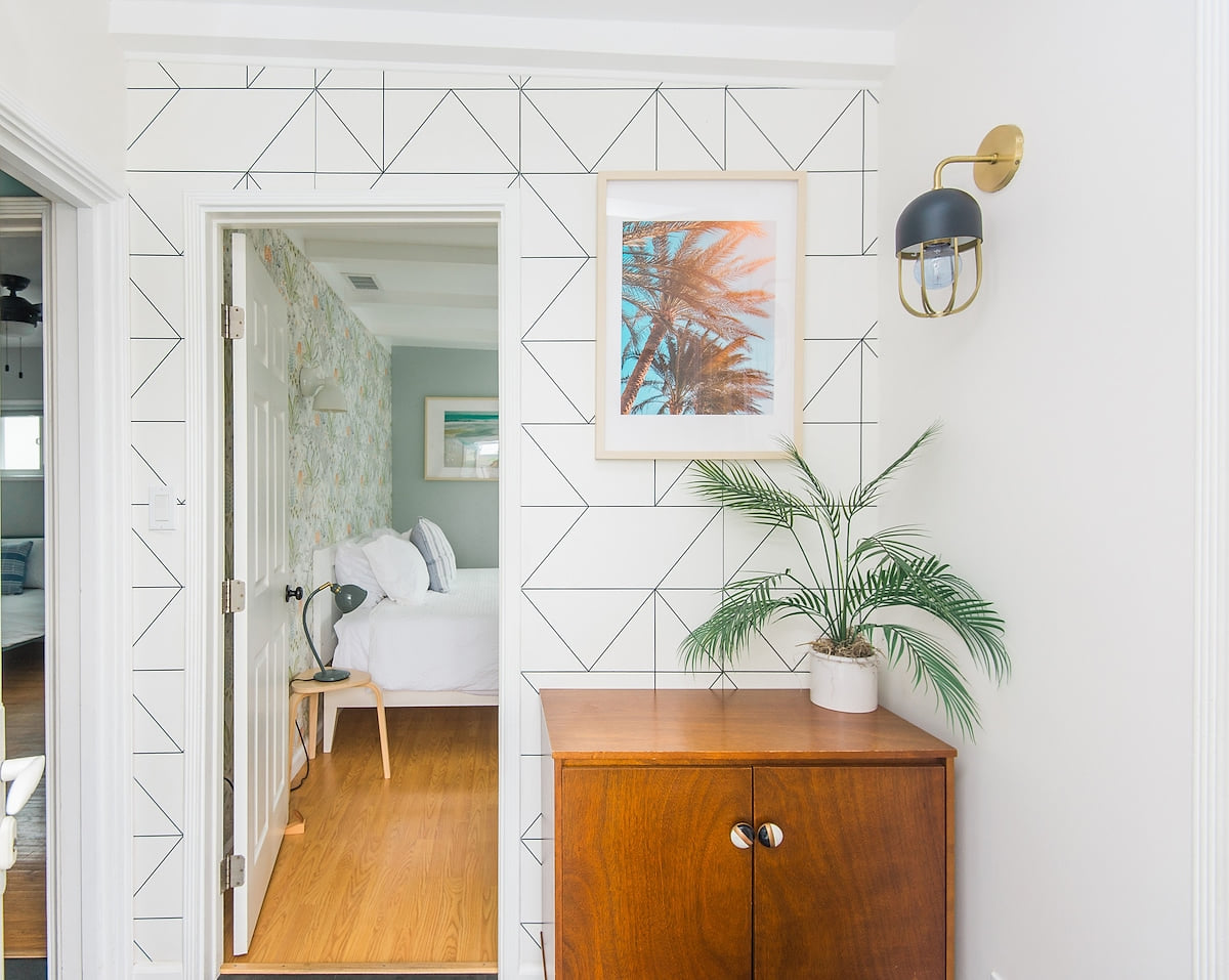 A glimpse into the master bedroom which features a king size bed and plenty of closet space.  Private Hot Tub & Yard | 15 min. Walk to Beach