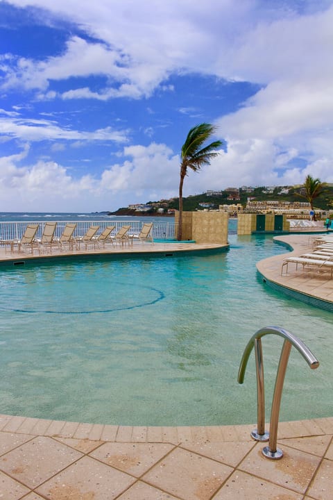 Resort infinity pool with jacuzzi. 
