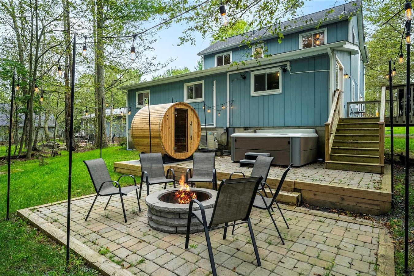Your backyard oasis awaits! Unwind in the hot tub, relax in the sauna, or gather around the fire pit for cozy evenings under the stars.