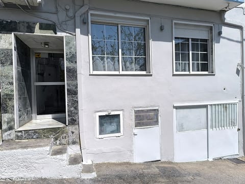 Front of a building and main entrance of an apartment building.