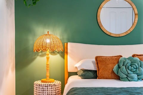 Our plush bed with a convenient nightstand offers the perfect blend of comfort and convenience for a restful night’s sleep.