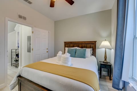 No steps to this bedroom (queen bed,) with connecting main floor full bath, including the kitchen, living room and in-unit washer/dryer, all on 1 level. 3 more bedrooms and 2 baths are upstsirs.