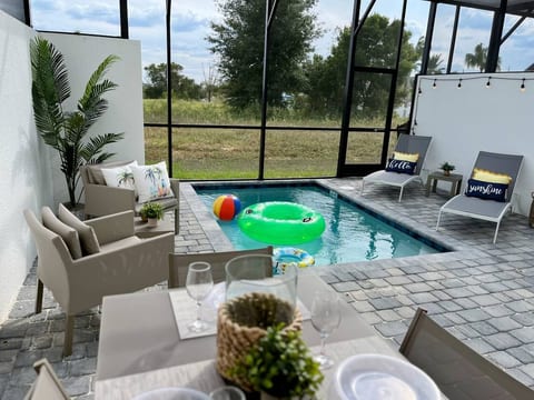 Enjoy complete privacy with a fully fenced pool-your own oasis! Backs onto small lake for relaxation and fun. Enjoy the floaties and pool while having a BBQ on the patio! We love our "Lakeside Villa".