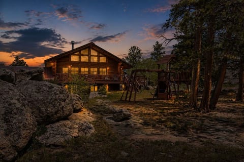 Secluded sunset cabin with a spacious deck and family-friendly outdoor playset