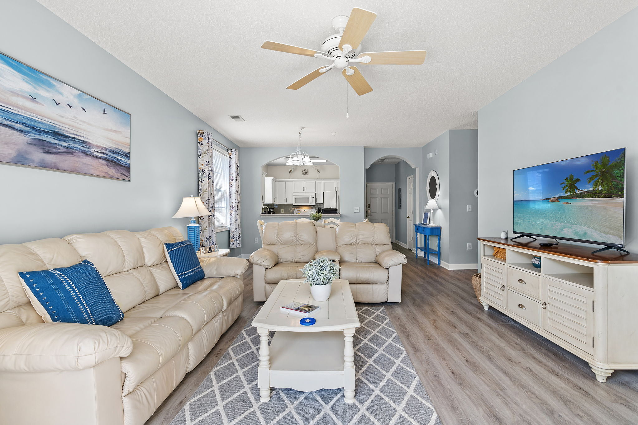 Welcome to your coastal escape at Cypress Bend in Barefoot Resort. This sunny open-concept condo features a comfortable living room with plush leather seating, new SMART TV, and a balcony right off the living room.