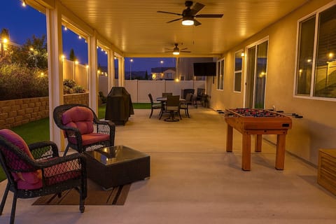 Spacious Patio & Backyard with Games, lots of seating options and BBQ
