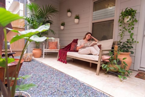 Cozy outdoor patio and a firepit for chilly evenings. Also, plants.