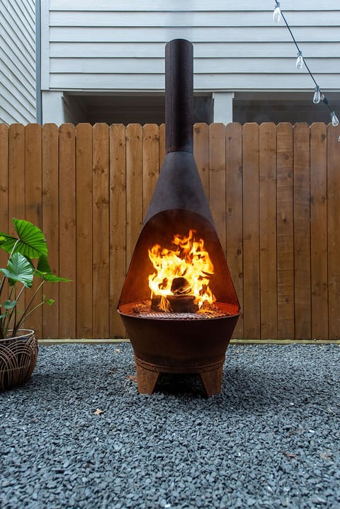 Cozy outdoor patio and a firepit for chilly evenings