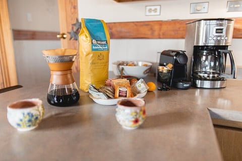 Make any meal you desire in the fully equipped kitchen including nespresso maker, chemex, drip coffee, pots, pans, measuring cups, crockpot, ninja blender, measuring cups, and .. I think you get it