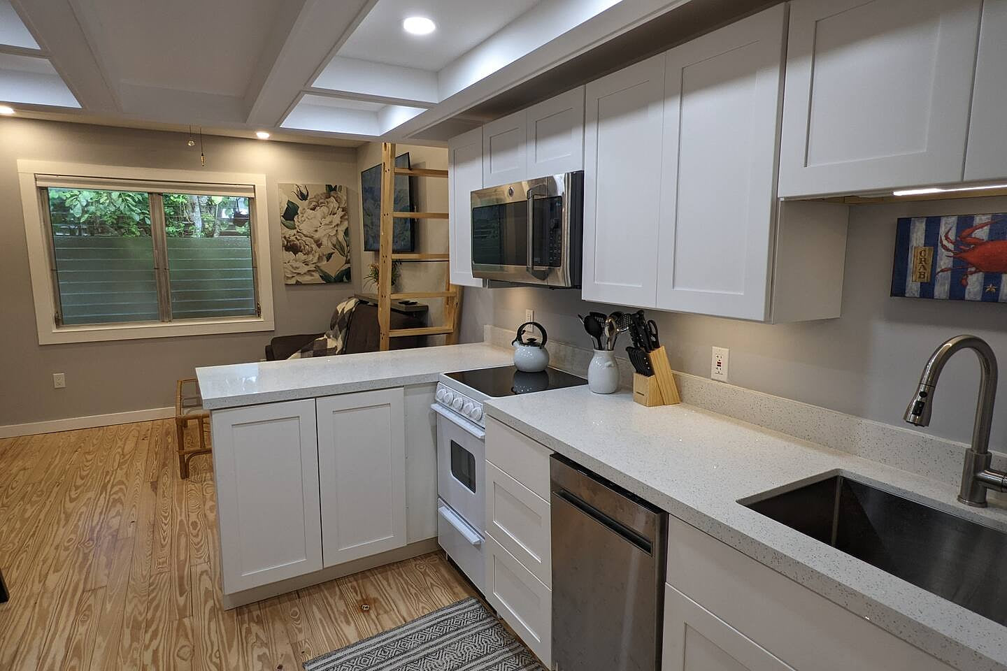 Quartz countertops, dishwasher and electric stove