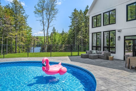 Lakefront Luxury Retreat w/ Heated Pool and Arcade