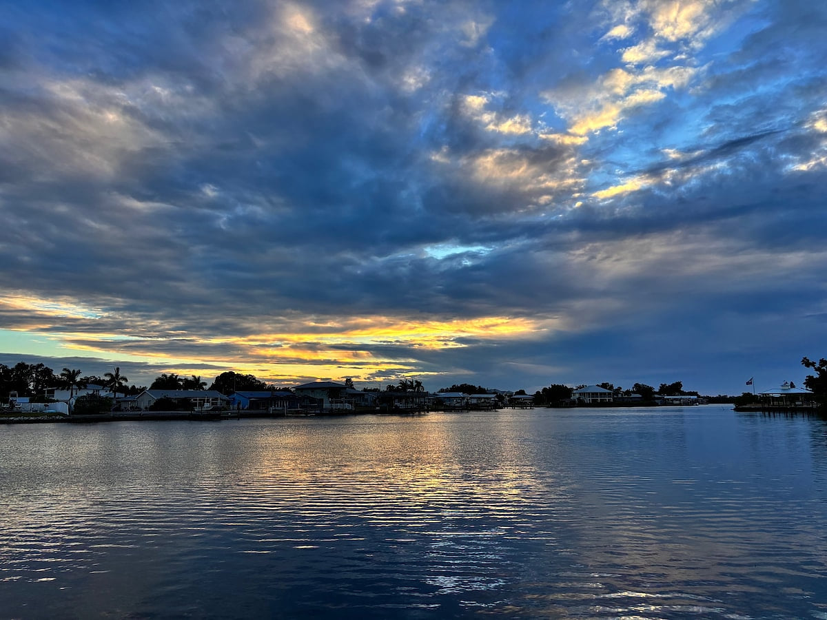 About a 2 minute walk outside to this view! With boat ramp for instant water access! Boat parking, for 1 boat included, during your stay! Kayaks available for rent! (Picture taken on site, back on the bay)