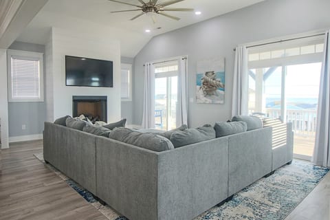 Open floor plan living and dining area and kitchen. Fully stocked kitchen with basic cooking utensils