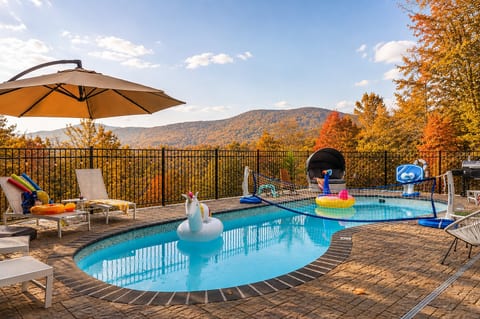 Take a dip in the pool and enjoy sweeping mountain views framed by the beautiful colors of fall.