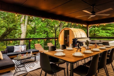 Dine al fresco at this table that seats 12 while your family lounges outside in the hot tub and sauna or watches the outdoor TV.