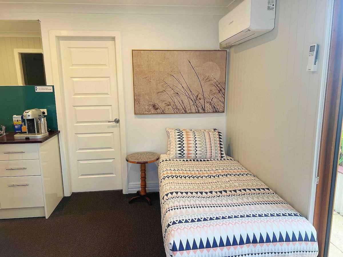 single bed in the small living room, very convenient for a family to use Whole Private Holiday Resort