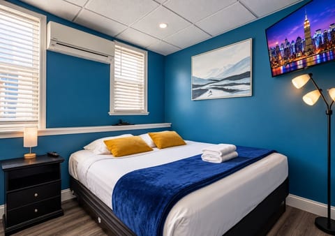 Bedroom 4 (master) — Queen bed AND twin-over-twin bunk bed. Sleeps 5. Portable crib in closet.