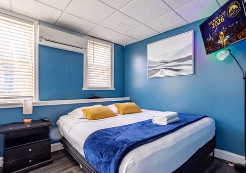 Bedroom 4 (master) — Queen bed AND twin-over-twin bunk bed. Sleeps 5. Portable crib in closet.
