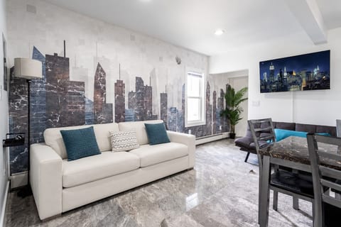 Modern living space — designed for group hangouts and watch parties.