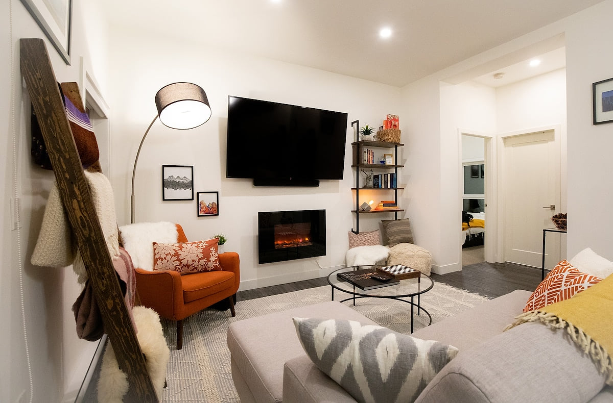 Plenty of Blankets and Pillows to Cozy Up on the Couch with