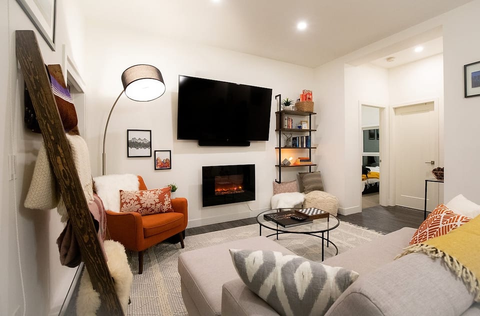 Plenty of Blankets and Pillows to Cozy Up on the Couch with