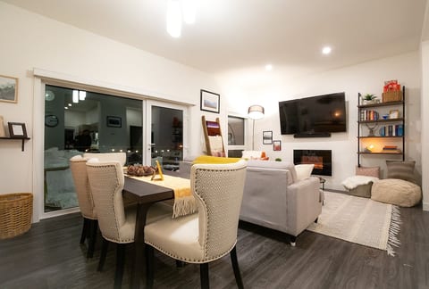 Dining Room and Living Room Full of Local Art