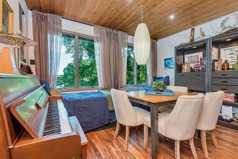 On the left side of the 4th bedroom suite, you'll find a piano, 2 comfortable twin beds, a games table and wall unit chocked full of games, puzzles and more goodies to enjoy.