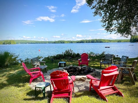 Firepit with 12 adirondack chairs