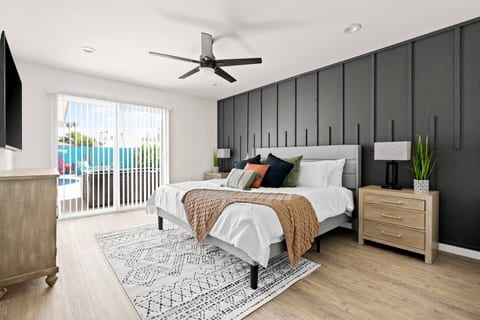 Relax in the Master bedroom with access to the backyard & spa. Ensuite bathroom and walk-in closet.