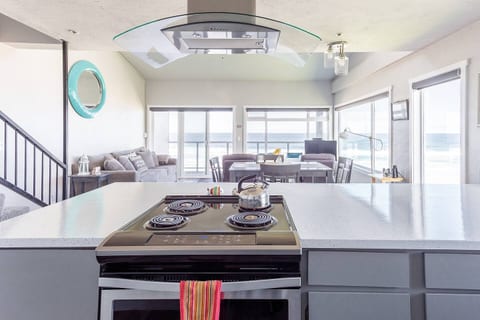 Who wouldn’t want to cook with these views? Even with the sunshades down, the ocean still shines through. The kitchen is stocked with pots, pans, utensils, waffle maker, blender, and pantry basics like spices, sugar, flour, and oil.