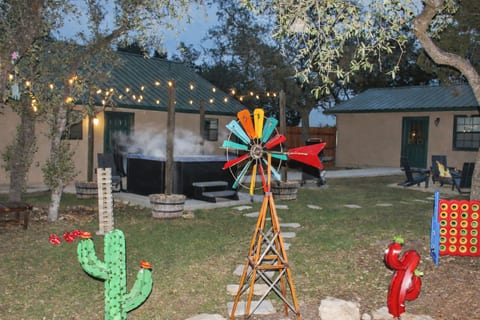 Your backyard retreat — hot tub, fire pit, mini golf, and Texas Hill Country charm