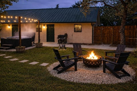 Gather around the fire pit after dark — string lights, s'mores, and Hill Country skies