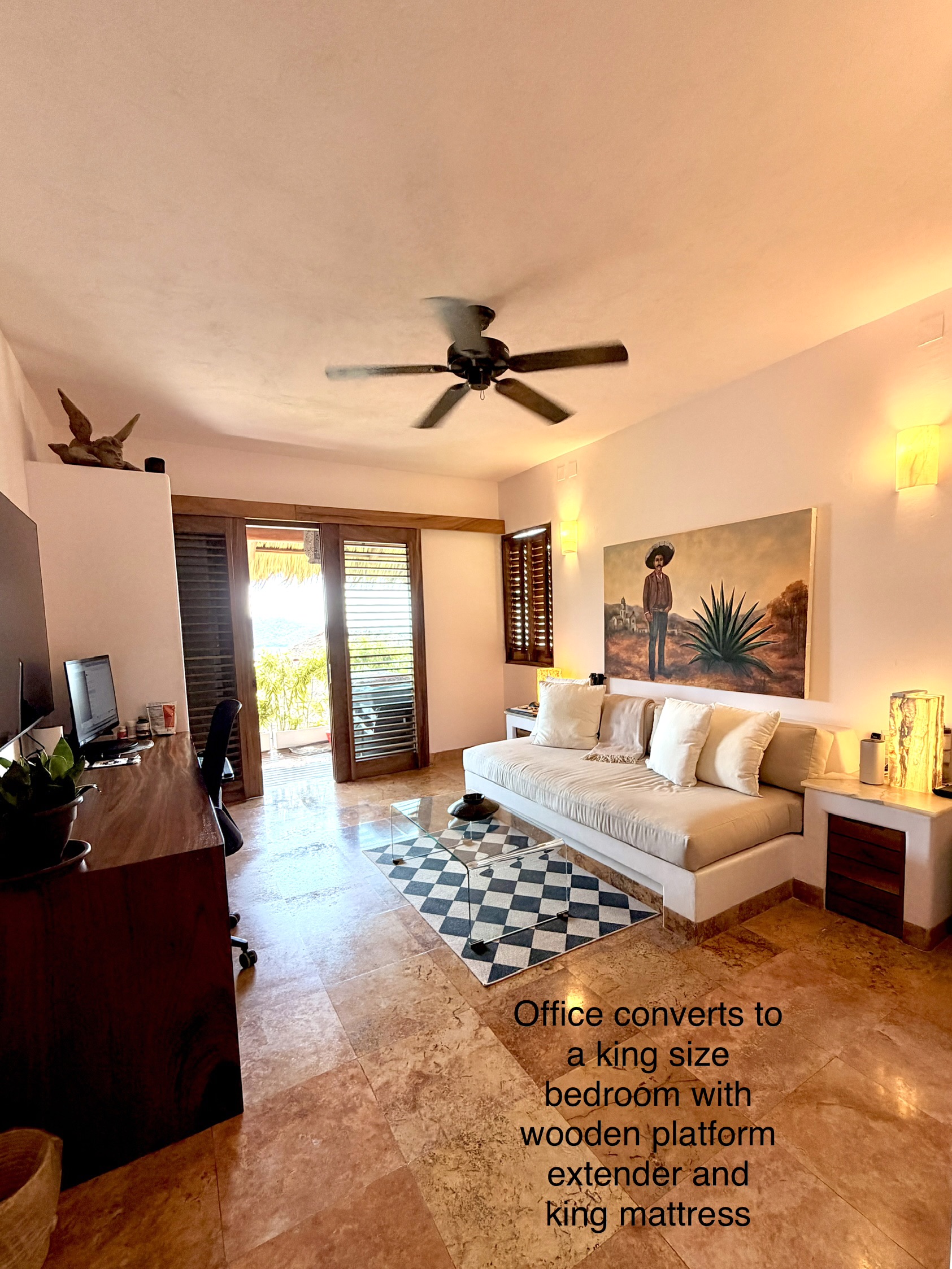 Bedroom two. This shows set up as an office, it converts to a king sized bed with a wooden platform and king mattress. Can be set up to your liking.