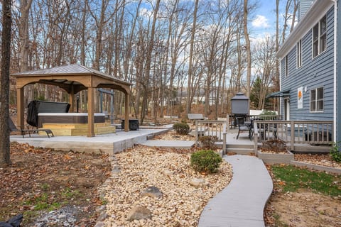 Beautiful outdoor space with a large hot tub!