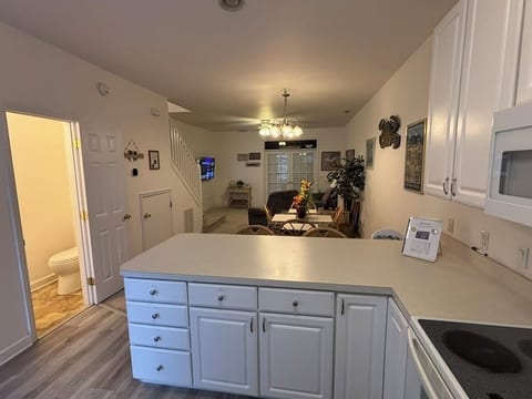 From Kitchen, 1/2 Bath, Dining room and Living room