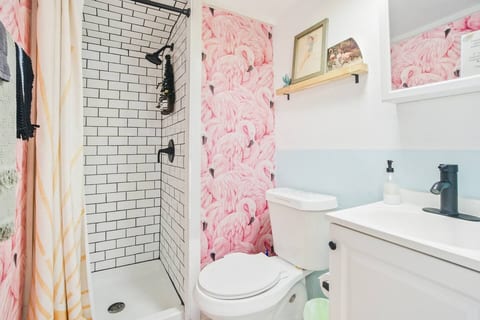 [Bathroom] Full size standing shower with plenty of warm water & great shower pressure.
