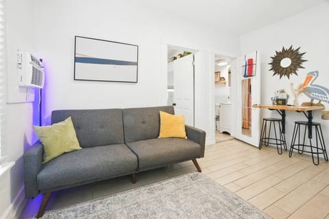 [Living area] Sofa folds out into a sofa bed for additional sleeping space