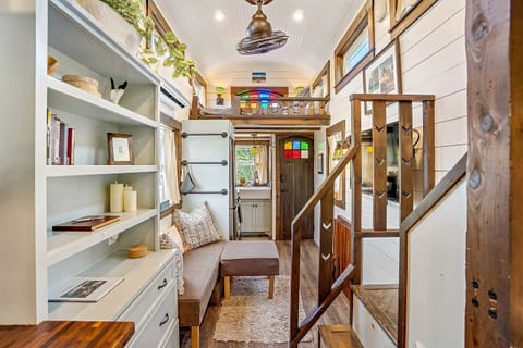 [Living area] This luxury 270sqft craftsman style tiny home is in the ideal location for your beach getaway.