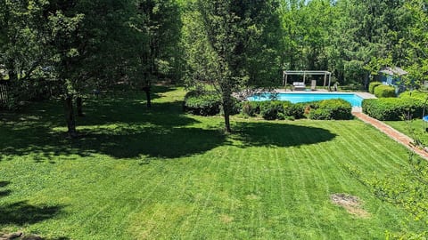 Back deck overlooking the backyard and pool.