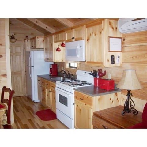 Kitchen with Dishes, Pots, Utensils, Toaster, Blender