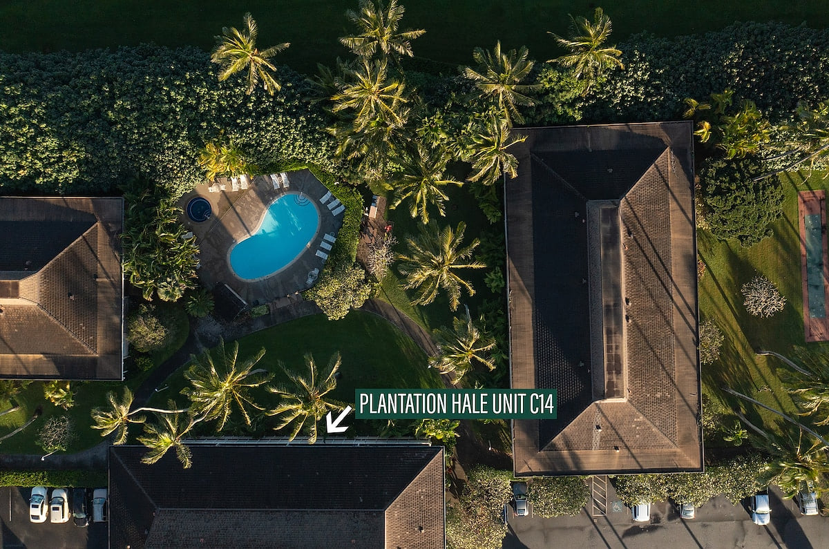 View of pool 1 & hot tub from above. Newly renovated Coconut Coast 1BR condo w/ A/C