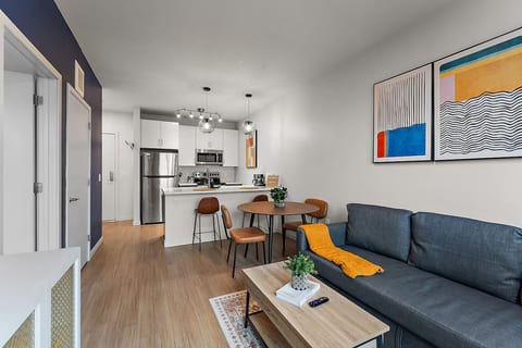 Living Room: Stylish space for relaxation with modern decor and a sunny dining area!