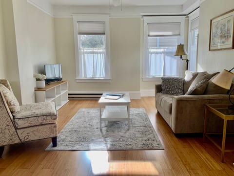The living spaces have wonderful natural light, comfortable seating and a smart tv.
