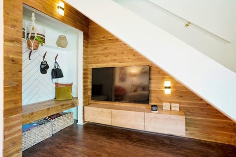 TV area with mudroom
