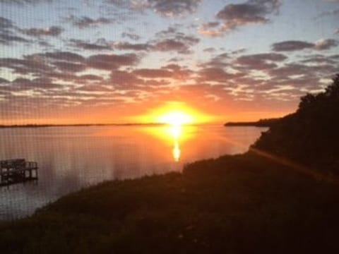 Sunrise over Sarasota Bay from condo decks/bedroom/living room