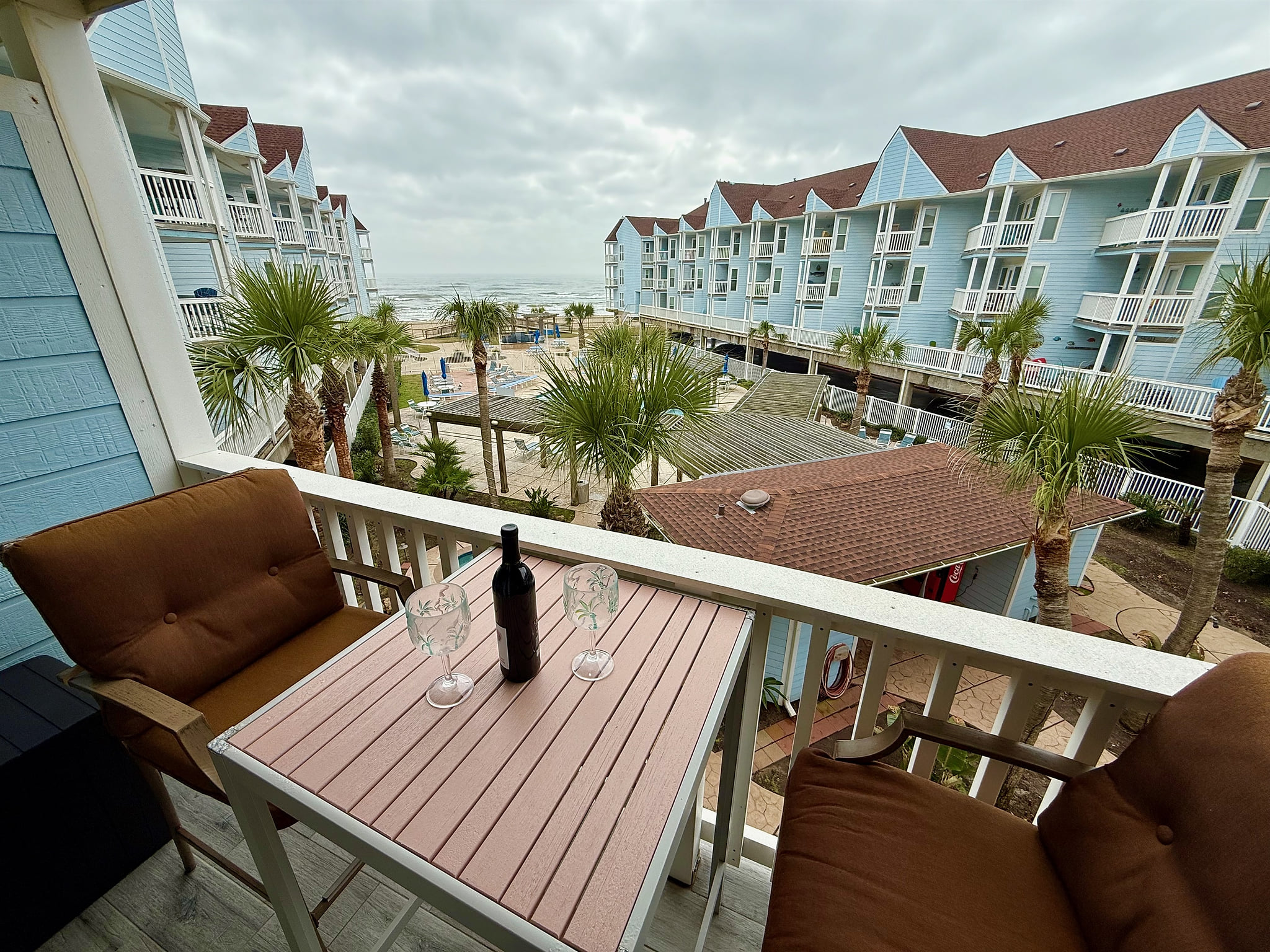 Sip and savor sunset moments on your private balcony overlooking the pools and Gulf—complete with coastal breezes and resort relaxation.